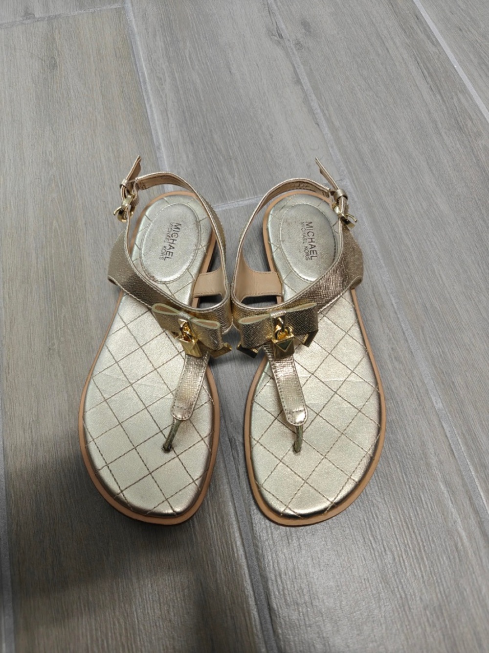 MICHAEL Michael Kors Women's Gold Metallic T-Strap Sandals